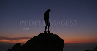 Buy stock photo Hiking, silhouette and sunset with mountain climber on peak for adventure or journey. Fitness, sky space and travel with person climbing at summit in nature for exercise, evening hobby or health