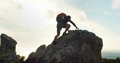 Buy stock photo Climbing, hiking and travel with man in nature for trekking, adventure and summer vacation. Explore, backpacking and mountain summit with person on cliff for rock, freedom and holiday tourism
