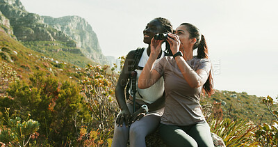 Buy stock photo Women, friends and relax with binocular for hiking, nature sightseeing and mountain view. Happy, people and gear for travel, backpacking adventure and birdwatching observation with wildlife search