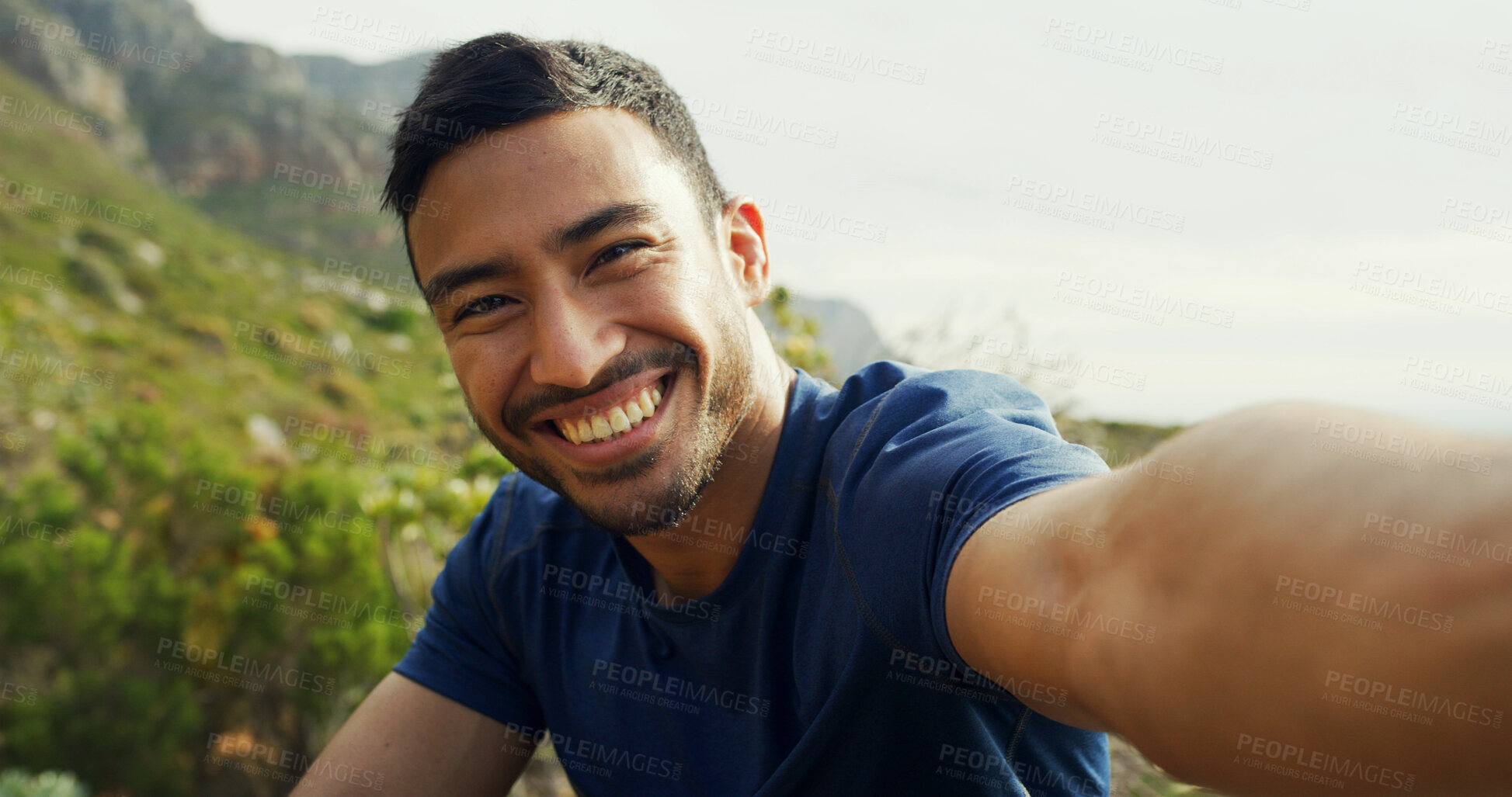 Buy stock photo Selfie, hiking and happy man outdoor for vacation, POV and travel influencer by mountain. Asian person, portrait and profile picture for trekking, adventure and photo for social media in Cambodia