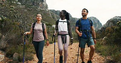 Buy stock photo Friends, holiday and hiking stick in nature for travel, walking and group vacation together. Man, women and outdoor with trekking pole for adventure, expedition or explore mountain path on journey