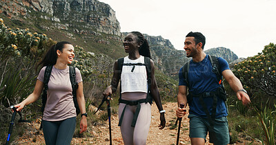 Buy stock photo Friends, hiking and laughing in nature for travel, walking and group talking on vacation. Man, women and outdoor with trekking pole for adventure, funny joke and explore mountain path on journey