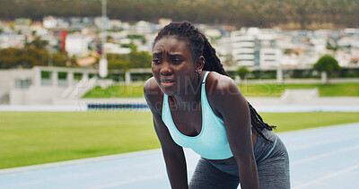Buy stock photo Runner, tired and thinking with black woman in stadium for workout fatigue, marathon endurance or vision. Exhausted, cardio challenge and training with person on race track for reflection and athlete