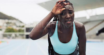 Buy stock photo Runner, tired and sweat with black woman in stadium for workout fatigue, marathon endurance and sports. Exhausted, cardio challenge and training with person on race track for exercise and athlete