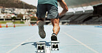 Man, legs and runner with start for race, speed or sprint in athletic takeoff on stadium track. Back view, male person or athlete with starter block, motion or move for sport challenge or competition