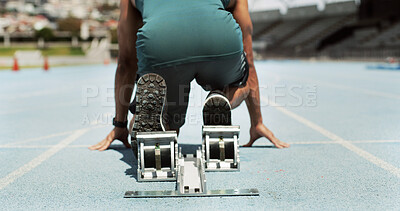 Buy stock photo Running, start and block with man on race track for fitness, competition practice and workout. Begin, marathon challenge and athlete with legs of person in stadium for exercise, training and cardio