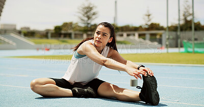 Buy stock photo Runner, woman or stretching legs on race track for health, wellness or exercise preparation outdoor. Sports, athlete or warm up hamstring on field at stadium to start training, fitness or flexibility