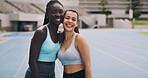 Runner, smile and portrait with friends in stadium for workout, marathon endurance and sports. Team, cardio challenge and training with women on race track for exercise, competition and athlete