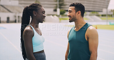 Buy stock photo Talking, people or athlete on track for break, exercise or fitness for wellness or teamwork. Chat, runners or woman with man in stadium for sports training, conversation or race with healthy friends