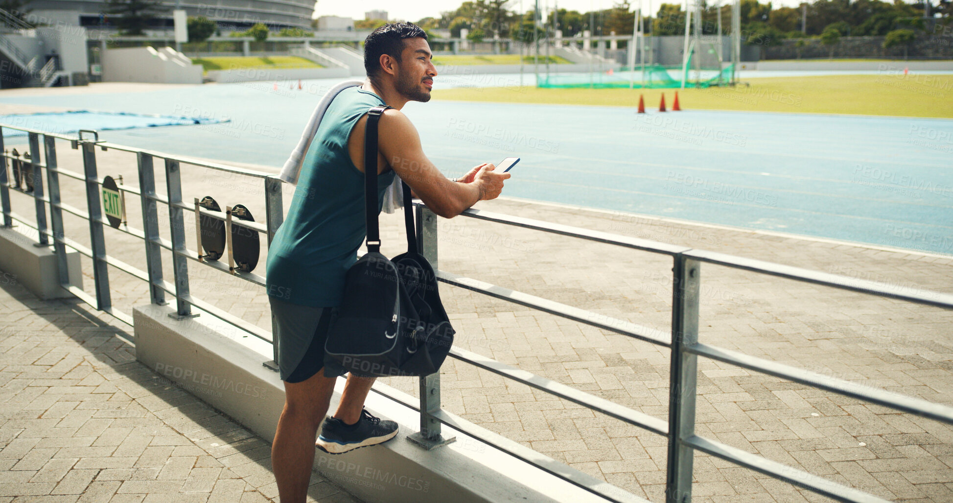Buy stock photo Thinking, athlete and man with smartphone, field and sportswear for fitness, calm and workout break. Outdoor, runner and planning for marathon, wellness and person with mobile, wonder or reflection
