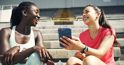 Buy stock photo Friends, phone and women in stadium for fitness, exercise and training for social media on steps. Happy, laughing and people on smartphone for online message, internet and mobile app for workout post