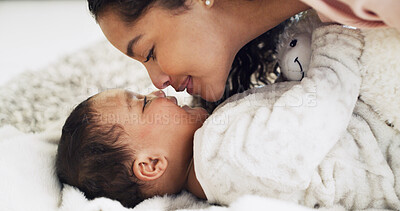 Buy stock photo Kiss, bedroom and mom with baby in home for rest, comfortable and relax for bonding. Family, parent and mother with child for love, relationship and care for support, development and affection