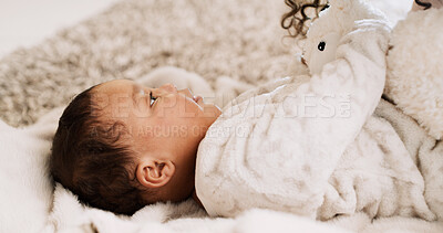 Buy stock photo Home, baby and playing with teddy bear, bed and adorable girl with toy in nursery, growth and relax. House, child and fun with plush animal, development or comfortable on mattress, resting and infant
