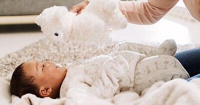 Buy stock photo Teddy bear, parent and playing with baby, home and fun with adorable child in nursery room and game. Happy, girl and bonding with person in house, growth and development of infant with plush animal
