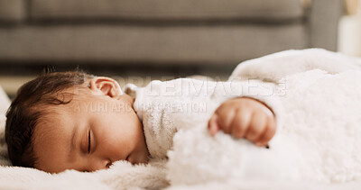Buy stock photo Tired, baby and sleeping on blanket in home for resting, morning routine and child development. Peaceful, infant and nap on living room floor for healthy growth, dreaming and comfortable in apartment
