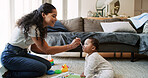 Mother, play and feeding baby in home for nutrition, growth and wellness with bonding on floor. People, mom and infant child with love, smile or eating food for diet in living room at family house