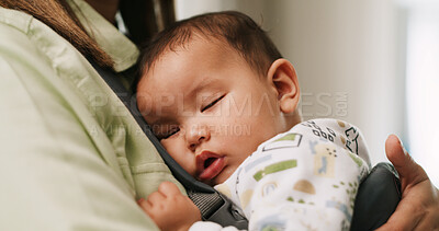 Buy stock photo Baby, carrier and sleeping on chest of mother for resting, security or child development. Family, peaceful infant or nap on woman in home for healthy growth, dreaming or bonding together with comfort