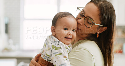 Buy stock photo Mom, kiss baby and care in home with comfort, smile and bonding with love, connection and embrace. People, mother and infant child with hug, relationship and happy with single parent at family house