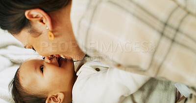 Buy stock photo Family, love and mother kiss baby for bonding, healthy relationship and childcare in home. Happy, childhood and mom and smile with embrace, care and relax together for affection and support in house