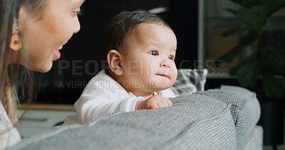 Buy stock photo Home, mom and bonding with baby, love or growth of child, development or smile in apartment or care. Mother, woman and family in living room, together and single parent with daughter, happy and house