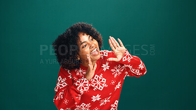 Buy stock photo Excited, woman and announcement for Christmas, studio and awareness for holiday discount or festive. Green background, shout and attention for xmas special, December offer and black person with smile