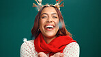Christmas, confetti and portrait of woman in studio for holiday season, celebration or smile. Festive event, xmas vacation and glitter with person on green background for space and December cheer