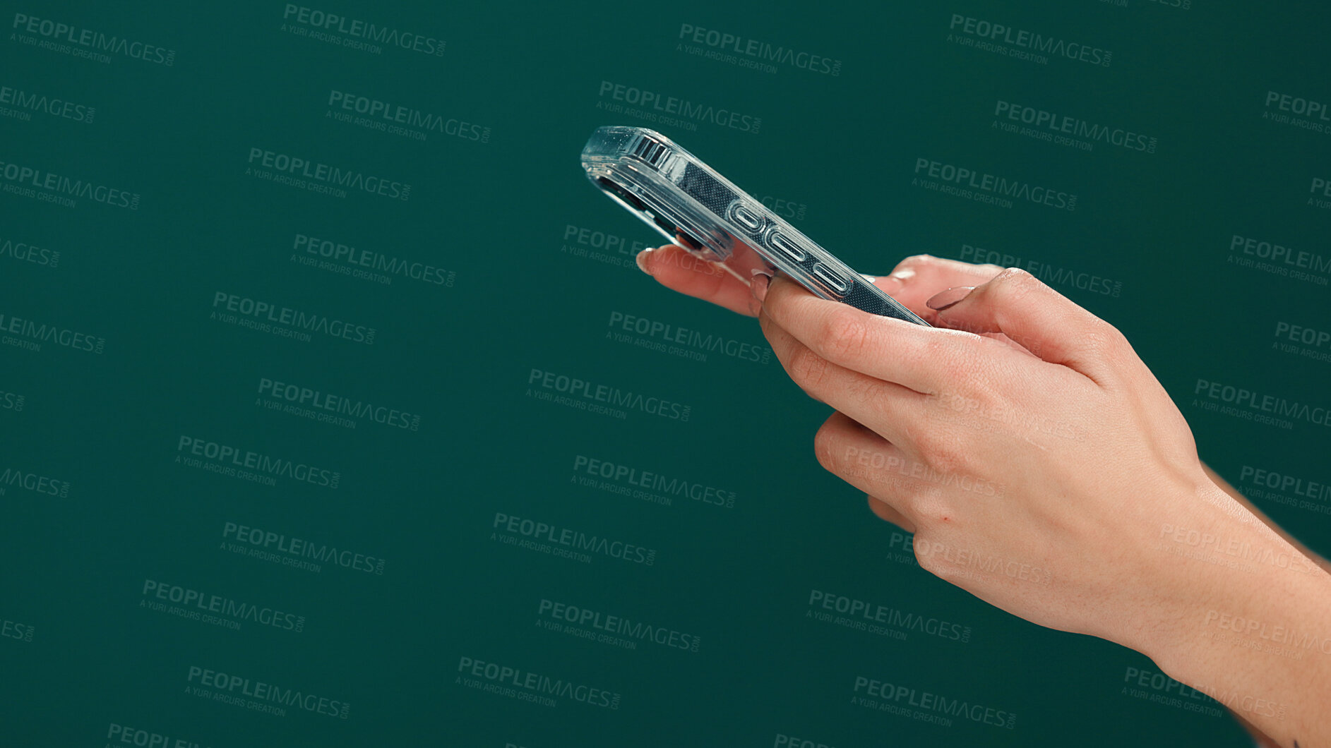Buy stock photo Mockup space, phone and hands of woman in studio with networking, communication or social media. Technology, contact and person with cellphone for online, mobile app or texting by green background.