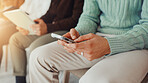 Hands, business and person with phone in waiting room for job interview, sign up and company website. Candidate, mobile and typing for research, online application and reading feedback of recruitment