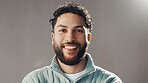 Happy, professional and portrait of businessman in studio with confidence for career development. Smile, male person and financial advisor from Colombia with pride for job by gray background.