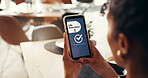 Cafe, online and hands with phone, life insurance and approval of application on web or information. Screen, status and person with mobile for financial protection, coverage and membership on app