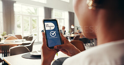 Buy stock photo Phone screen, life insurance and hands of woman for digital application, app and sign up. Claims status, membership benefits and cover research with female person for login and check mark in cafe