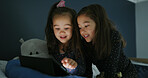 Happy, tablet and children in bedroom for movie, film or video on app for entertainment together. Bonding, night and sisters watching show on streaming website with digital technology in home.
