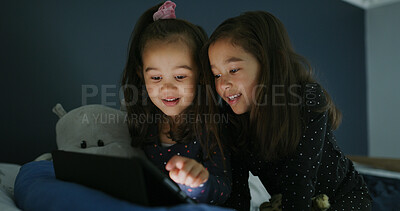 Buy stock photo Happy, tablet and children in bedroom for movie, film or video on app for entertainment together. Bonding, night and sisters watching show on streaming website with digital technology in home.