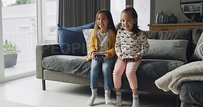 Buy stock photo Home, happy kids and play video game for competition, contest and entertainment on sofa. Sisters, girls and children with console for gaming challenge, hobby and relax together with family in lounge