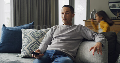 Buy stock photo Watching tv, dad and child with energy on sofa for chaos, playing and disturbance in home. Family, living room and father with remote for entertainment, streaming and movies with energetic girl