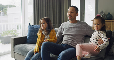 Buy stock photo Relax, bonding and father with children for watching TV, movie or film together in living room. Happy, entertainment and dad with girl kids on sofa for streaming show with connection in house.