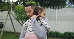 Dad, hug and child with love in backyard for comfort, empathy or sympathy at outdoor playground. Father, daughter or girl with embrace, safety or security for bonding, trust or support at play park
