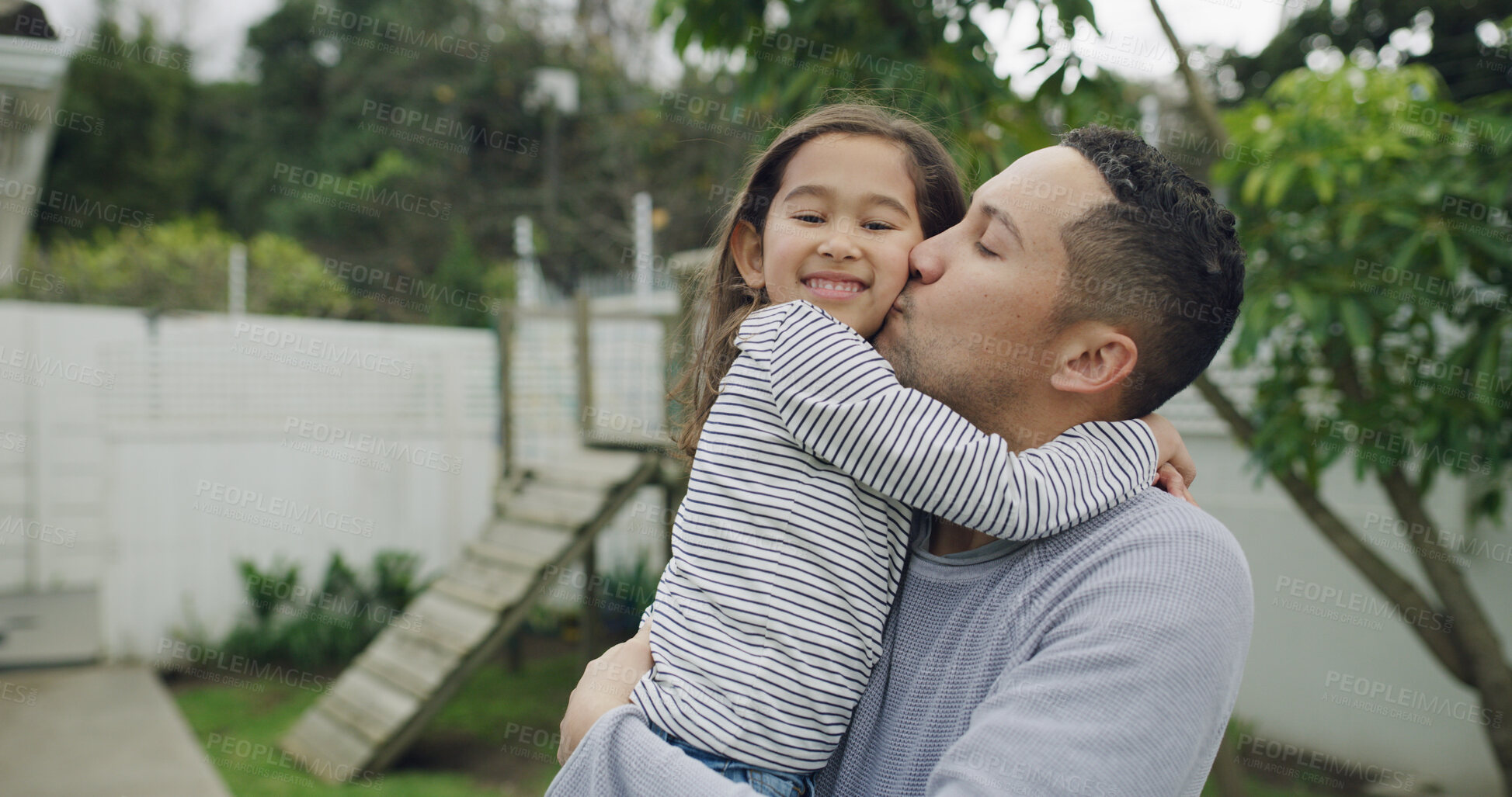 Buy stock photo Kiss, happy and dad with child in backyard for bonding, affection and relax outdoor on weekend. Family, love and portrait of father with girl for embrace, hug and connection together for support