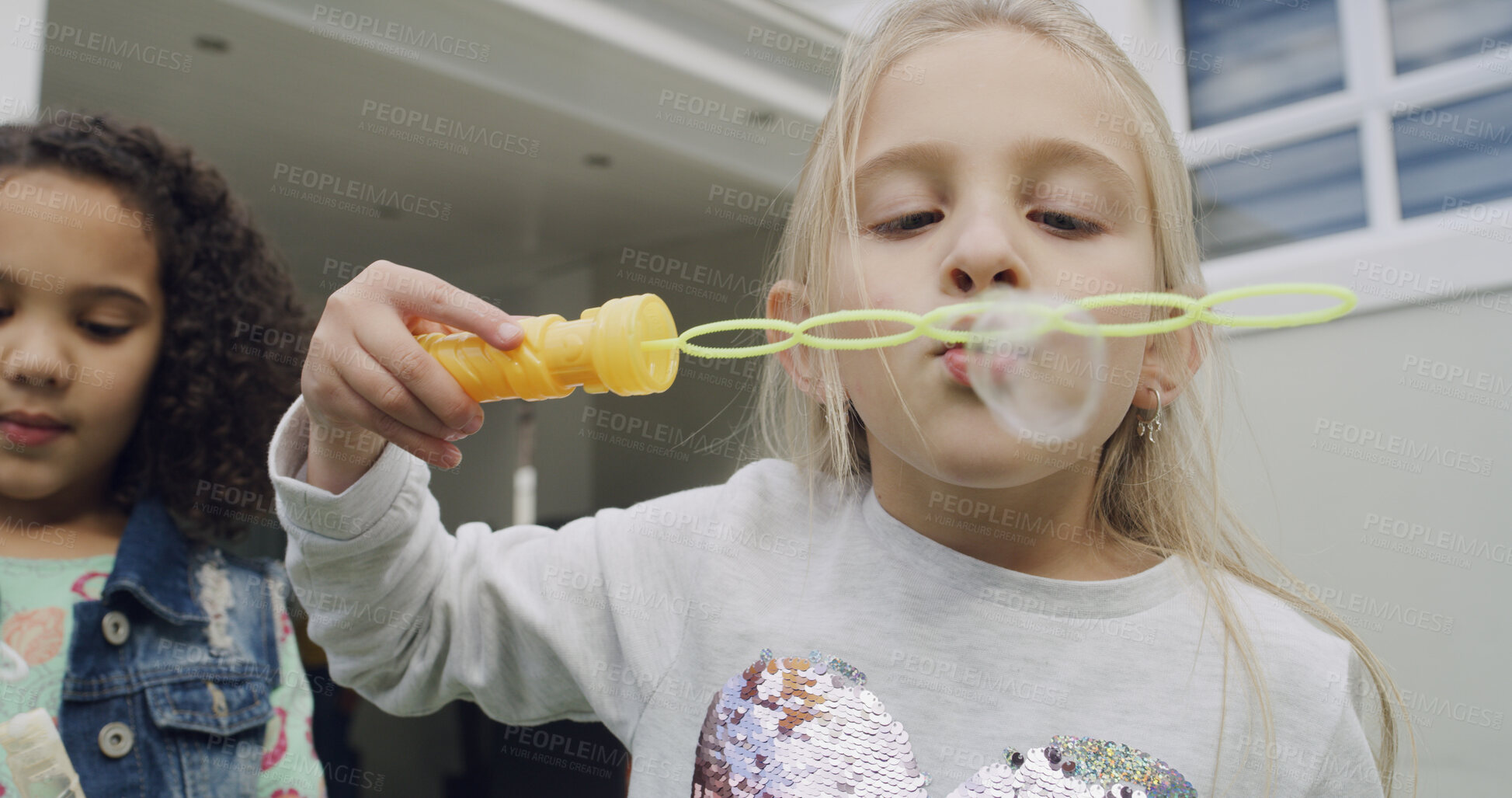 Buy stock photo Friends, children and blowing bubbles outdoor at home for game, bonding and fun at backyard. Playing, kids and girl with soap toys or wand for entertainment with hobby by house together on weekend