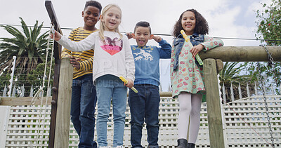 Buy stock photo Portrait, happy kids and friends at playground together with bubble toy, funny face and goofy. Smile, backyard and group of playful children with tongue out, silly and laughing outdoor in garden