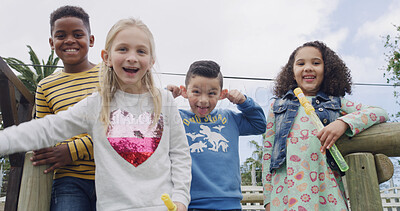Buy stock photo Portrait, happy kids and friends laughing at playground with bubble toys, funny face and goofy. Girls, boys and group of playful children with tongue out, silly and smile outdoor together at park