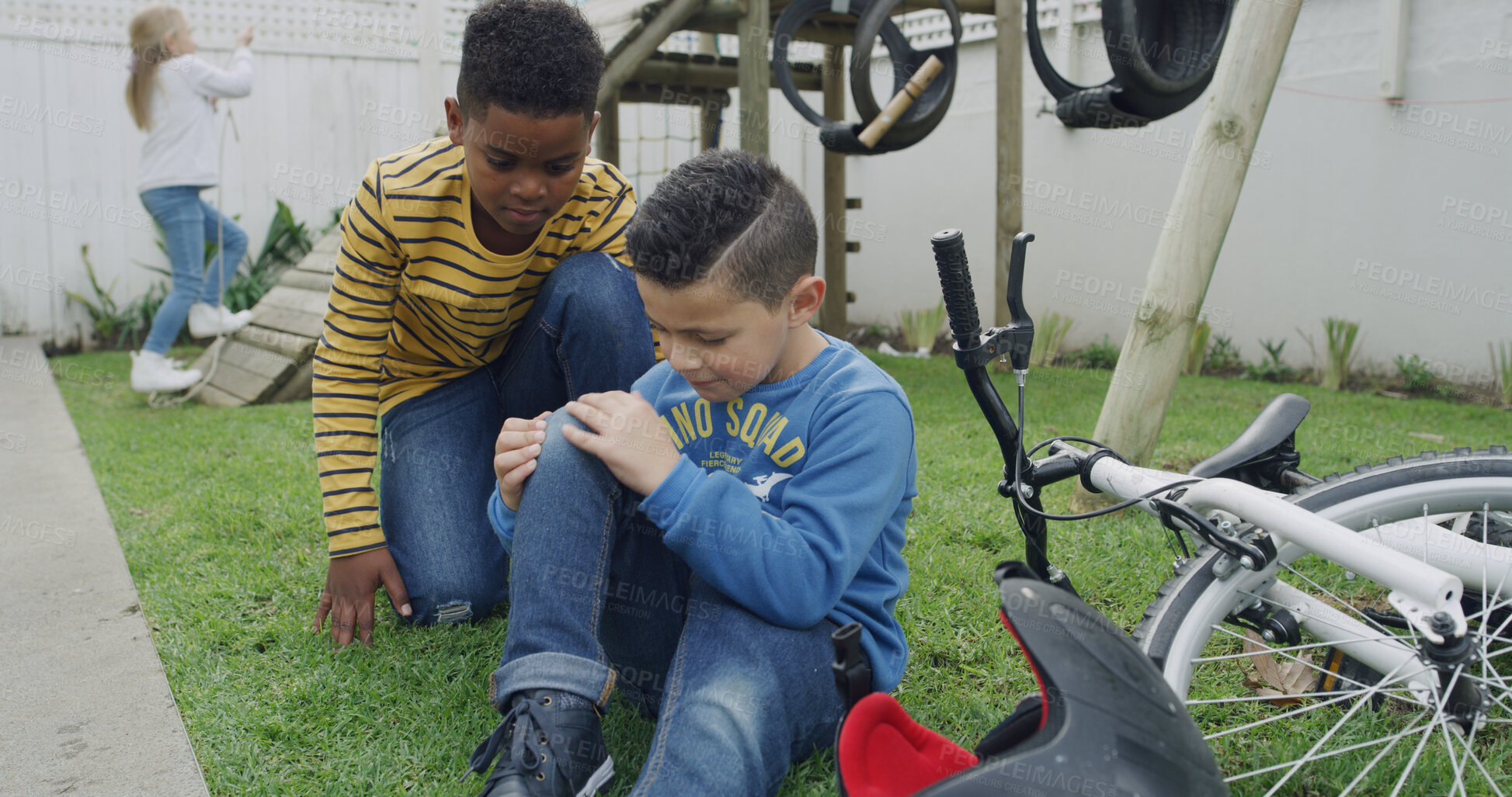 Buy stock photo Bike, checking and crash with kids on playground together for accident concern, help or worry. Fall, mistake and physical injury with children friends outdoor in park for care, comfort or consoling