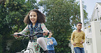 Smile, friends and child with bicycle outdoor for playing, running and hangout together. Happy kid, girl and riding bike for cycling, learning balance and group adventure with energy for travel