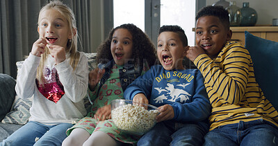 Buy stock photo Kids, scare and watching tv with popcorn on sofa for horror movie or online entertainment. People, group or children eating snack with fright for streaming subscription or cartoon thriller in home