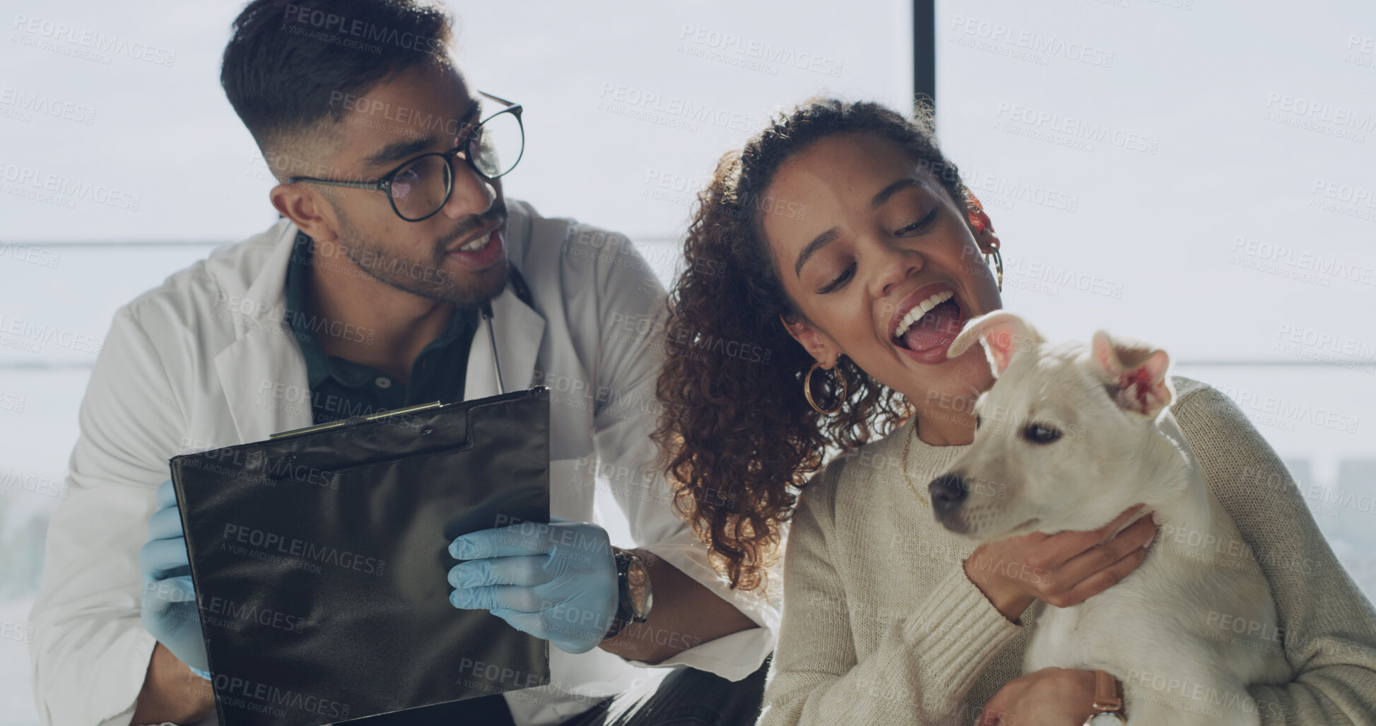 Buy stock photo Smile, veterinary and dog with woman in clinic for appointment, support and pet care. Animal welfare, medical treatment and help with man and puppy for checkup, diagnosis and healthcare together