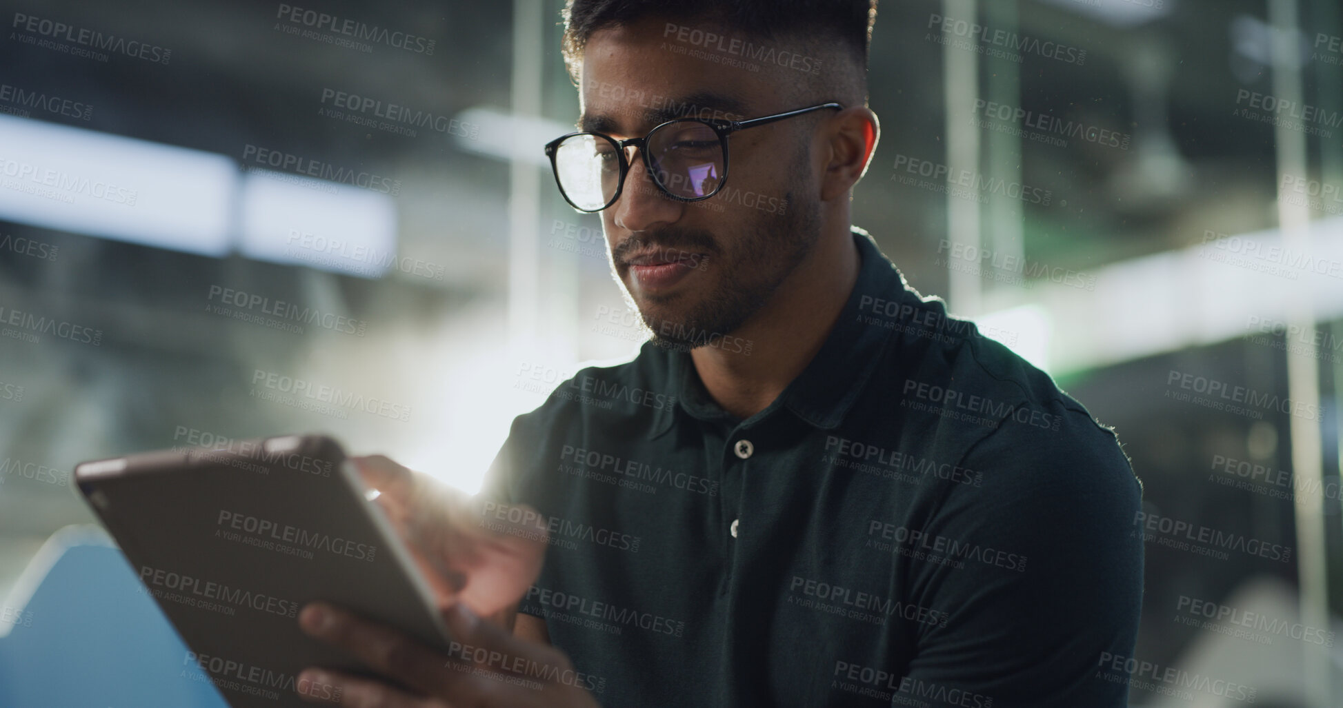 Buy stock photo Glasses, reading and tablet with man in terminal of airport for flight booking or travel schedule. Agenda, app and check in with passenger in lobby or waiting room at night for communication or trip