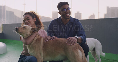 Buy stock photo Hug, happy couple and dogs at shelter for adoption, foster or choice for animal rescue with love. Pets, man and woman at pound for care, stroke or embrace with partner for support at charity together