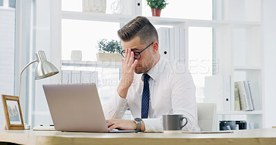 Buy stock photo Businessman, headache and mistake at office, laptop and eye strain with fatigue, burnout and glitch. Person, computer and migraine with glasses, stress or brain fog with vertigo at finance agency
