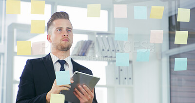 Buy stock photo Planning, glass and tablet with business man in office for mindmap, project calendar and brainstorming. Market research, sticky note and reminder with person in agency for online and moodboard 