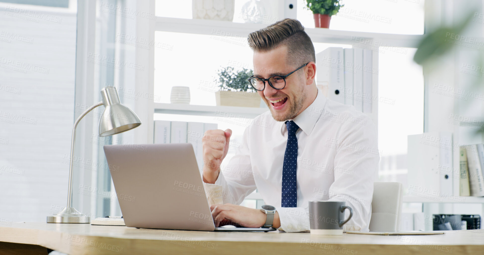 Buy stock photo Man, fist pump and celebration with laptop at office for goals, announcement or bonus at agency. Person, investor and excited with computer, happy and good news for salary increase at finance company